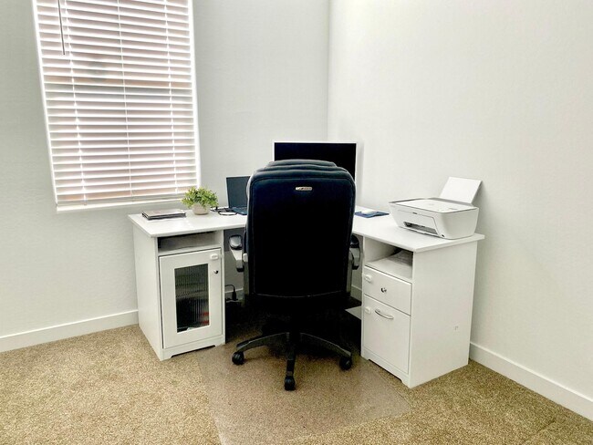 Second-Level Bedroom turned into an office. - 7027 S 13th Way