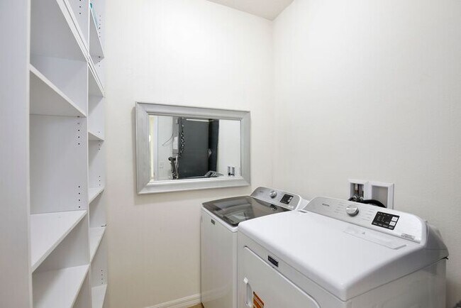 Building Photo - Water-View 4BR/3BA with 3-Car Garage in Gated North Shore - Near Lake Nona & Medical City