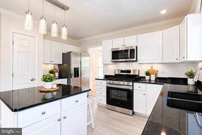 Building Photo - 12303 Milestone Manor Ln