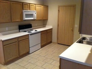 Building Photo - 3 Bedroom, 2 Bath, 2 Car Garage, Fenced Backyard
