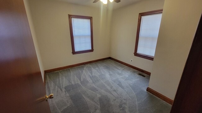 Building Photo - Two Bedroom Home with Fenced In Backyard