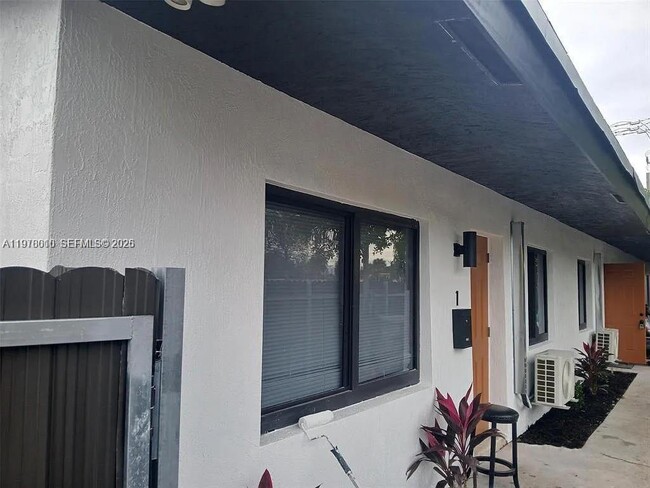 Building Photo - 900 NW 8th Ave