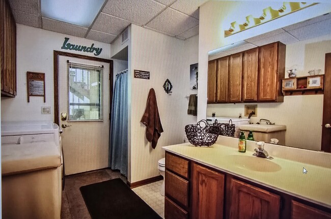 Lower full bathroom with washer and dryer - 808 Pony Ln