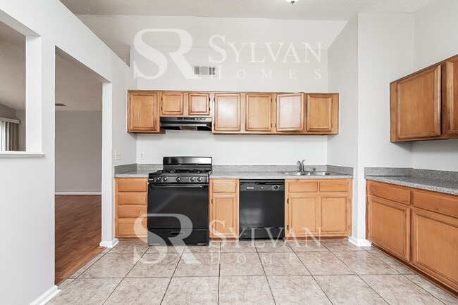 Building Photo - Lease today! No extra charge for contentme...
