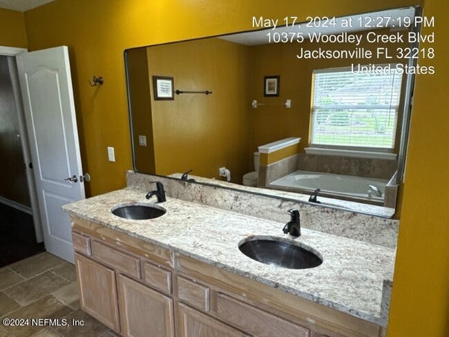 Building Photo - 10375 Woodley Creek Blvd