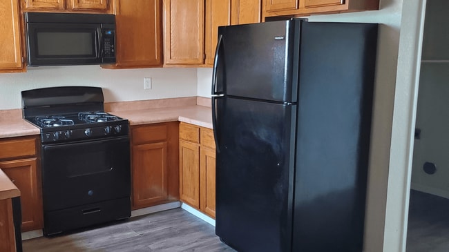 Building Photo - Mission Pass Townhomes