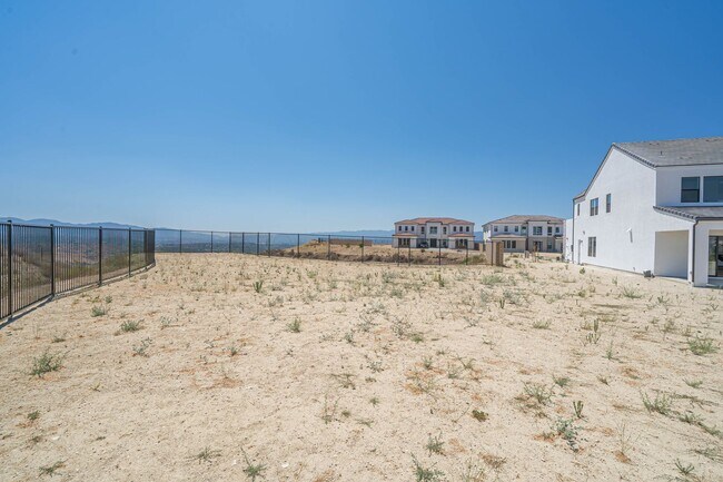 Building Photo - Spacious 5-Bedroom Home with Community Ame...