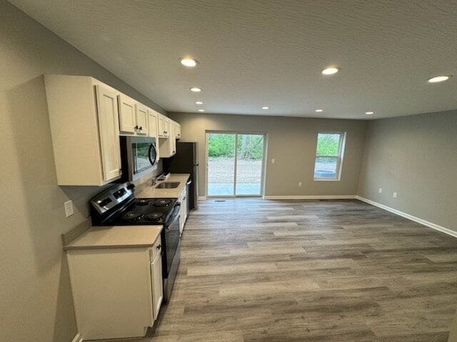 Building Photo - Brand-New 2 Bed / 1.5 Bath Townhome with Modern Finishes
