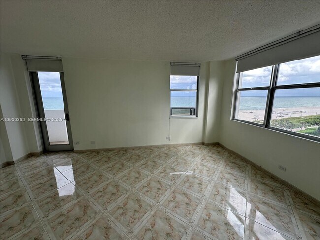 Building Photo - 6039 Collins Ave
