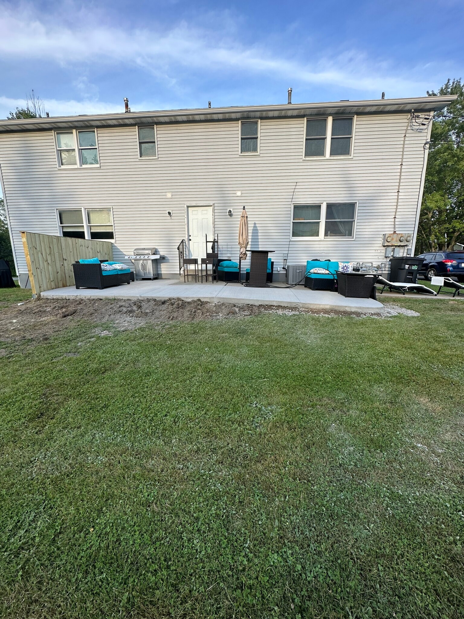 Back of building with patio - 7041 Clinton St