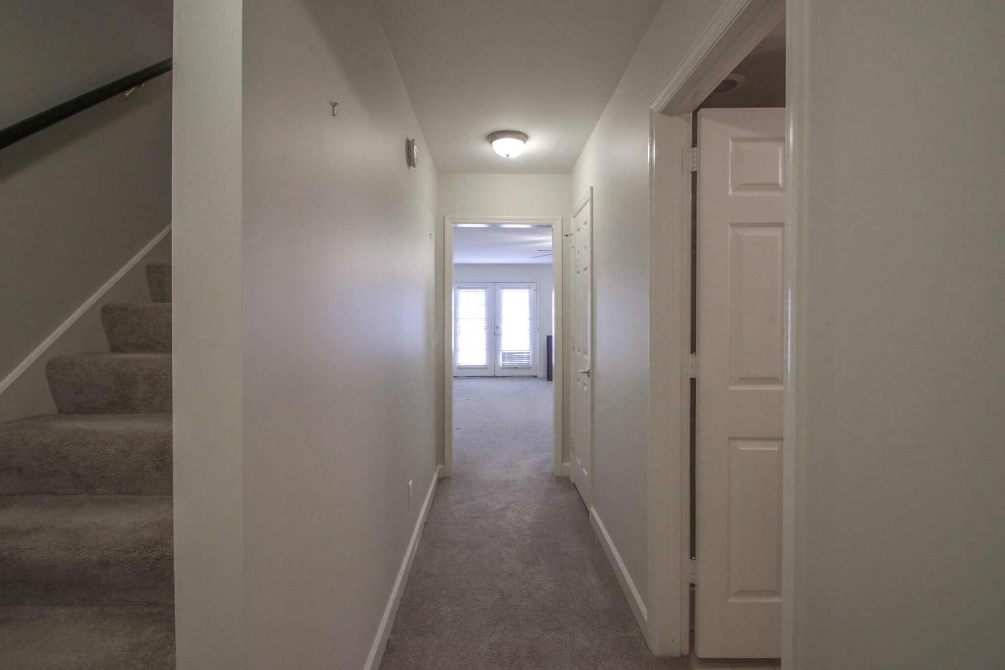 downstairs hall to bonus room - 1614 Brentwood Pointe