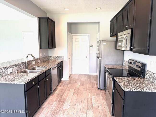 Building Photo - 6319 Autumn Berry Cir