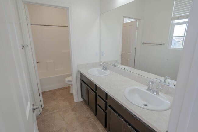 Building Photo - COMING SOON! Beautiful 4-Bedroom Home in the West Creek Community of Valencia!