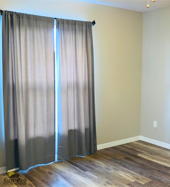 Building Photo - 5988 Sawgrass Point Dr