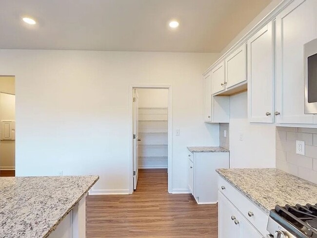 Building Photo - FIRST MONTH IS ON US   CHARMING 4- BEDROOM HOME IN LAURELBROOK COMMUNITY