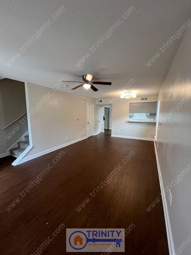 Building Photo - Cute TWO STORY Town Home!