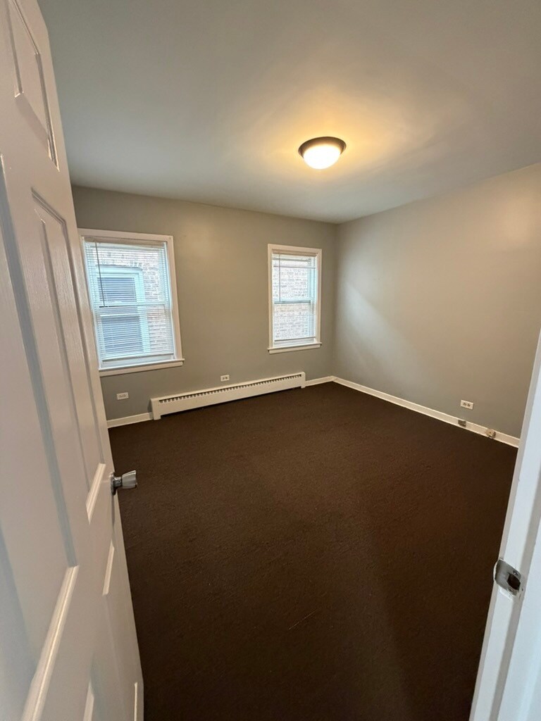 Building Photo - 5058 W Schubert Ave