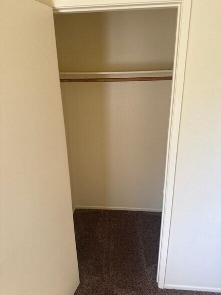 Bed 2 closet - 712 Summerwood Ln