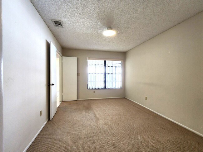 Building Photo - Open Layout; Fenced-in Yard; Quiet Neighbo...