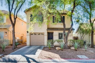 Building Photo - Very nice kept two-story 3 bedroom 2 bath house in a small gated community on the east side
