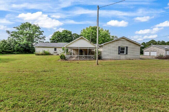 Building Photo - spacious 4-bedroom, 2.5-bath home featuring a 2-car garage and fresh updates throughout.