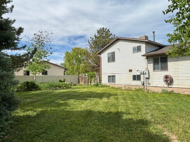 Building Photo - Cozy Home with New Paint & Flooring!