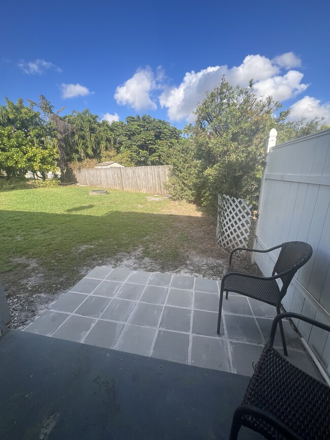 Patio area from rear kitchen door access. - 5823 NW 37th St