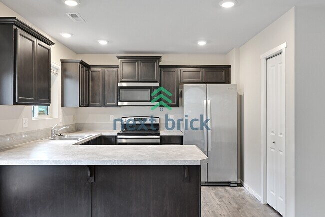 Building Photo - "Charming 4-Bedroom Home in Puyallup with Spacious 1831 Sq Ft Layout & 2.5 Baths!"