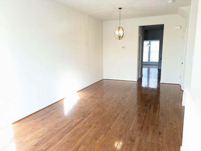 Building Photo - Brambleton Elegance: A Spacious Townhome Oasis