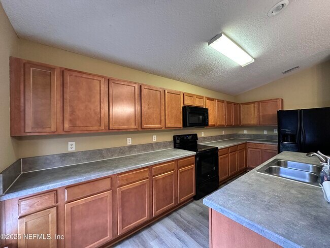 Building Photo - 2231 Brian Lakes Dr N