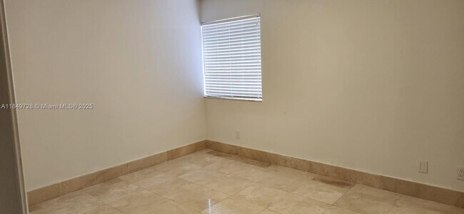 Building Photo - 10850 SW 153rd Ct