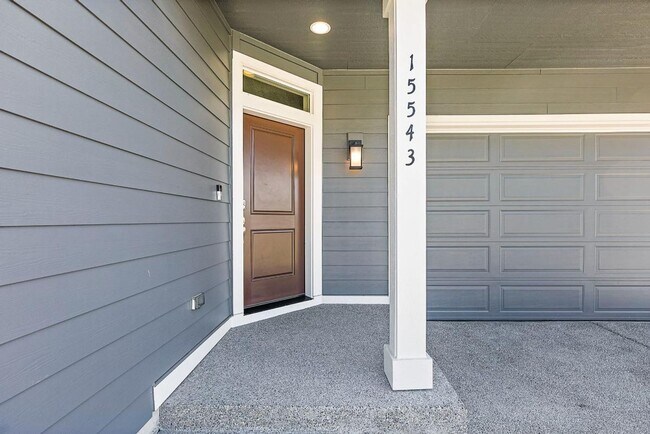 Building Photo - Modern 4-Bedroom Yelm Home with Covered Patio, Outdoor Fireplace & Office/Flex Space!