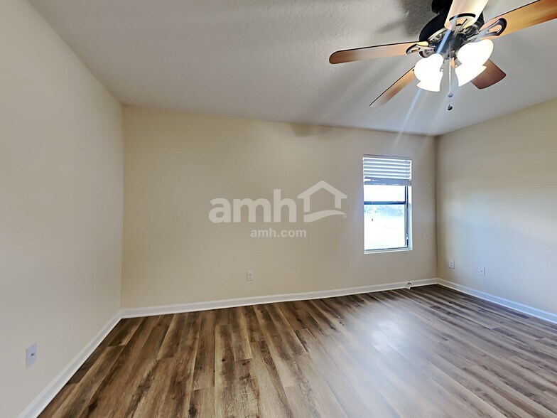 Building Photo - 7344 Rapid River Dr E