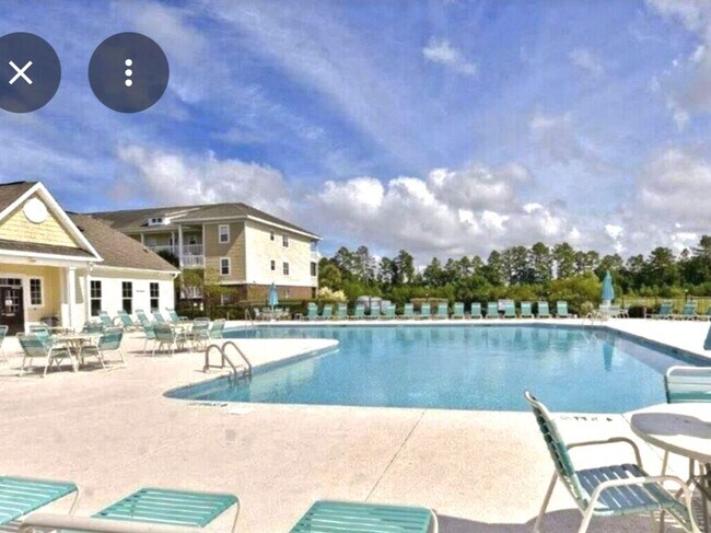 Building Photo - Stunning First-Floor, Fully Furnished Condo with Pond Views