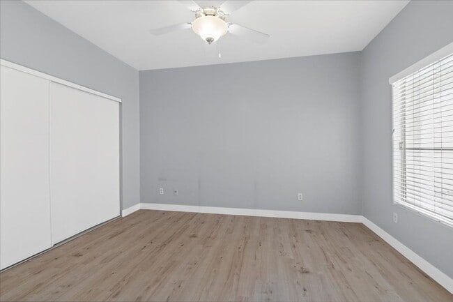 Building Photo - Sleek 2 Bedroom Condo with 2 Car Garage Ne...