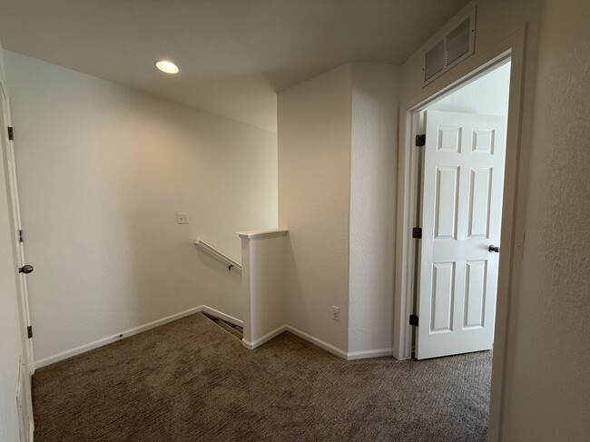 Top of stairs from guest bathroom - 8690 Ethan Aly