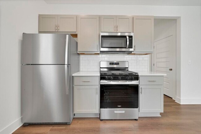 Building Photo - One Level Home with Garage and Fenced Back...