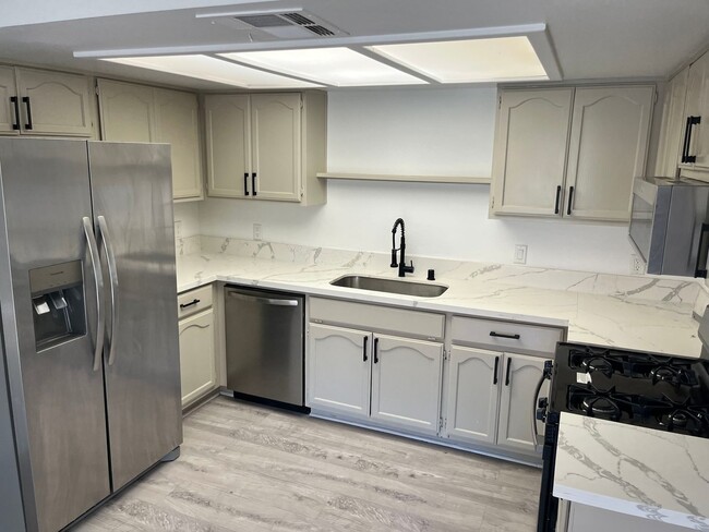 Primary Photo - Experience easy living in this bright and ...