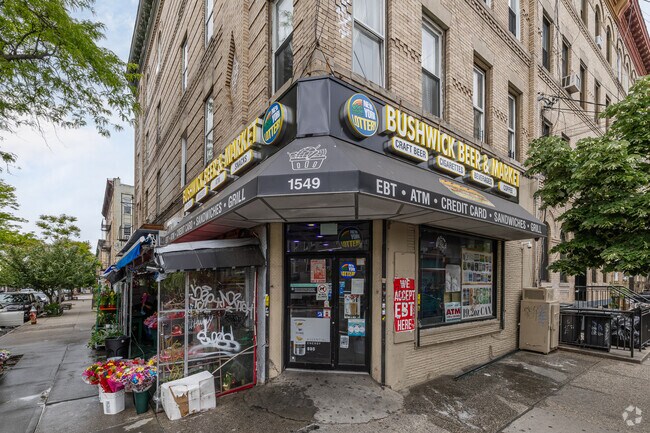 Building’s storefront. - 1549 Dekalb Ave