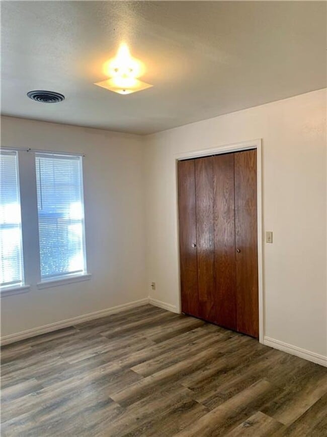 Building Photo - Charming Home with Open Kitchen, Fireplace & 2-Car Garage