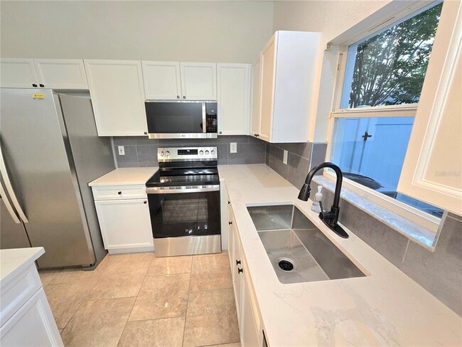 Building Photo - 13241 Opal Court North