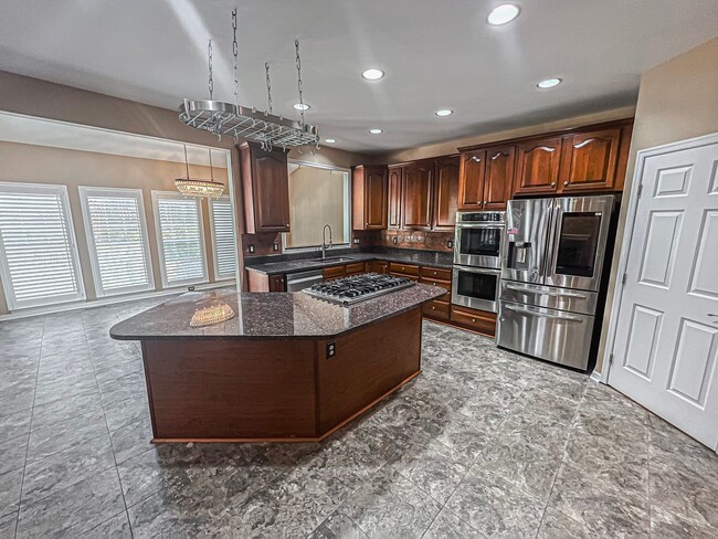 Building Photo - Stunning 4 Bedroom 3 Bathroom Brick Home W...