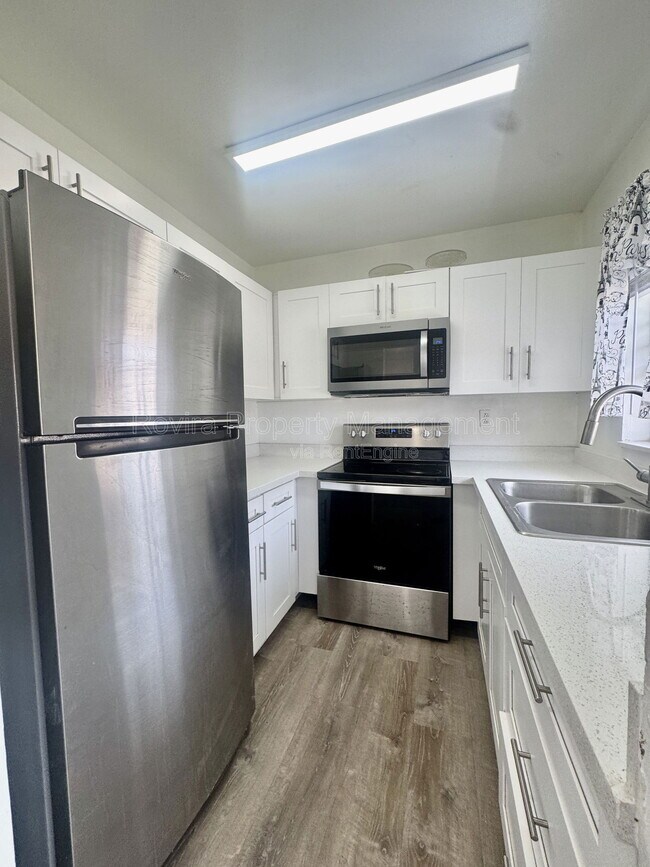 Building Photo - 5889 W 26th Ave