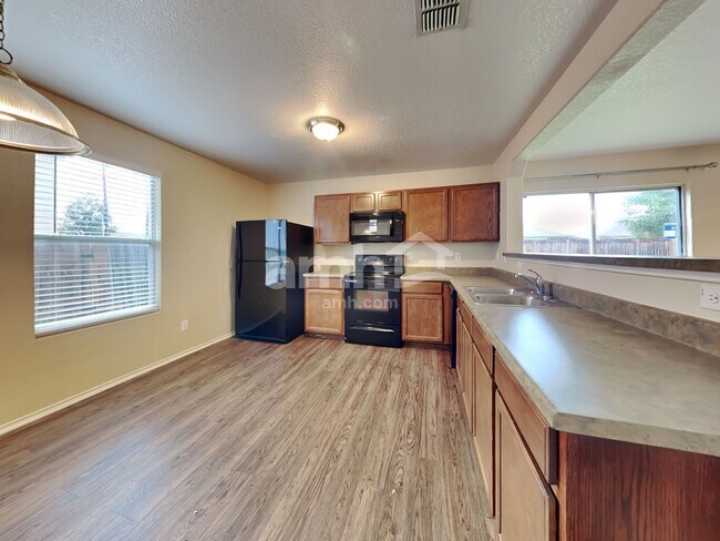 Building Photo - 10023 Woodland Pines