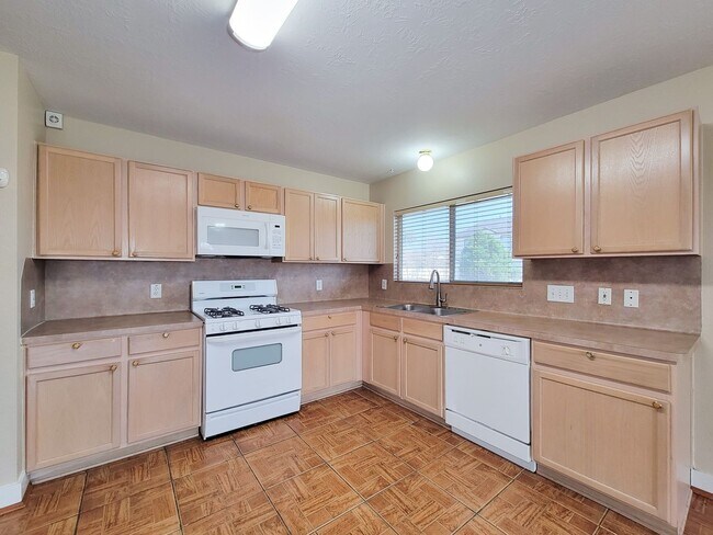 Building Photo - 3 bedroom one story home on large corner lot. Home has hard flooring throughout living areas and ...