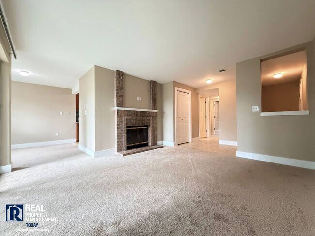 Building Photo - Prime Tacoma Narrows Condo with Covered Parking & Patio