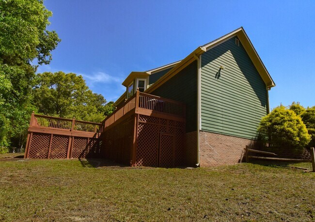 Building Photo - Coming Soon! 4 Bedroom 2.5 Bathroom With A Large Deck and 2 Car Garage! Near Methodist University