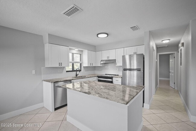 Building Photo - 201 Cocoa Isles Blvd