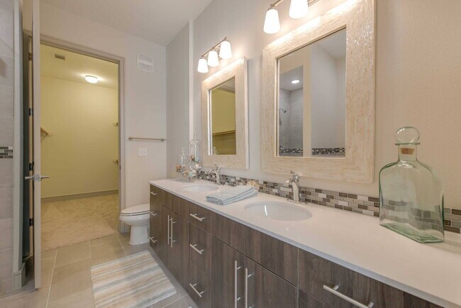 Building Photo - Experience the Art of Fine Apartment Living!