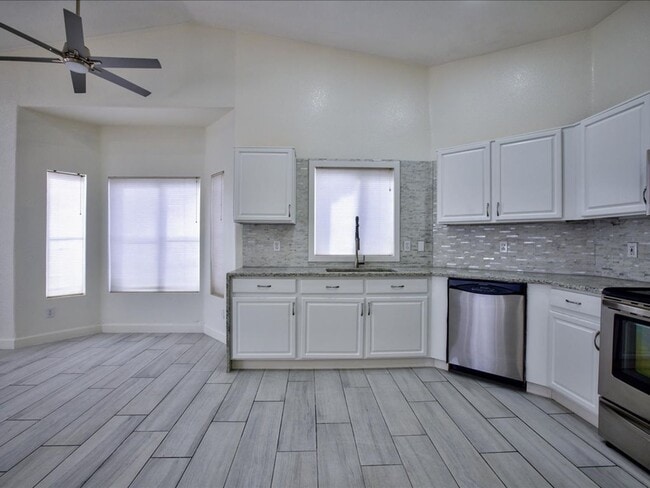 Building Photo - Spacious 3-Bedroom Home with 3-Car Garage & Large Backyard